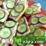 Turkey Ranch Baguettes on a red serving tray with text 'Turkey Ranch Baguettes'