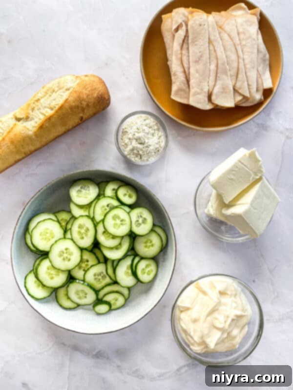 A cutting board filled with sliced Turkey Ranch Baguettes, ready for serving.