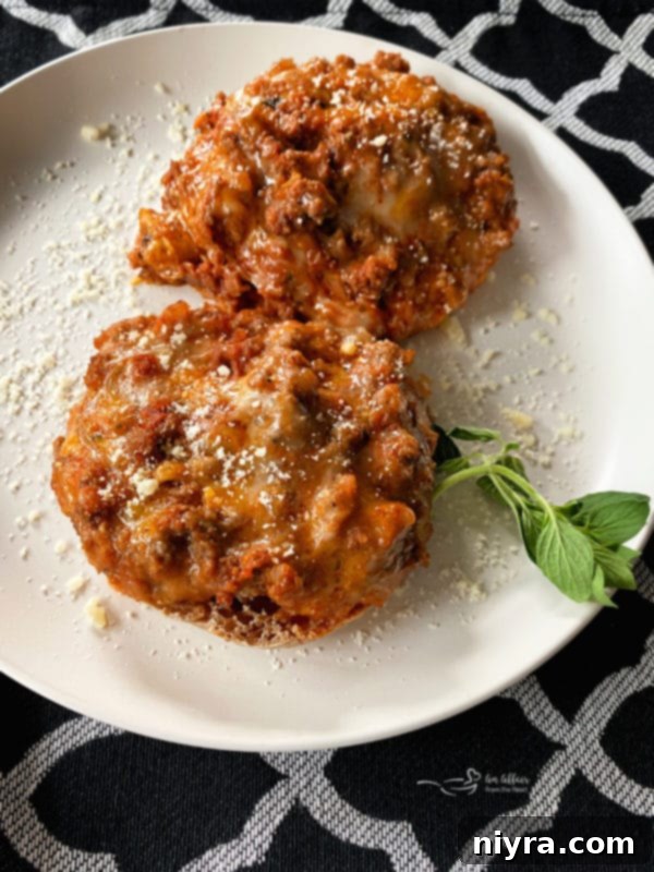 Pizza Burger Melts 2 Delicious Open-Faced Pizza Burgers on English Muffins, ready to be served