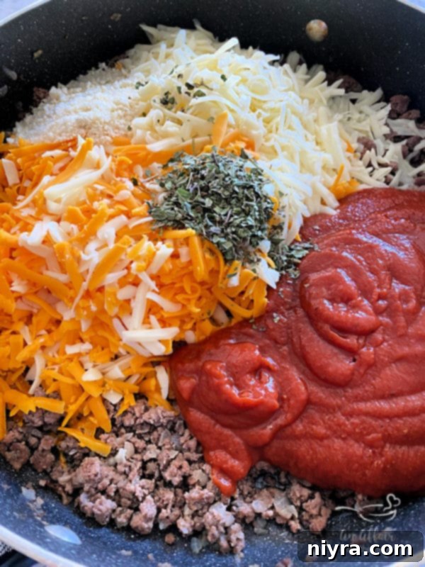 Pizza Burger Melts 4 Ingredients for Open-Faced Pizza Burgers laid out, including ground beef, cheese, and pizza sauce