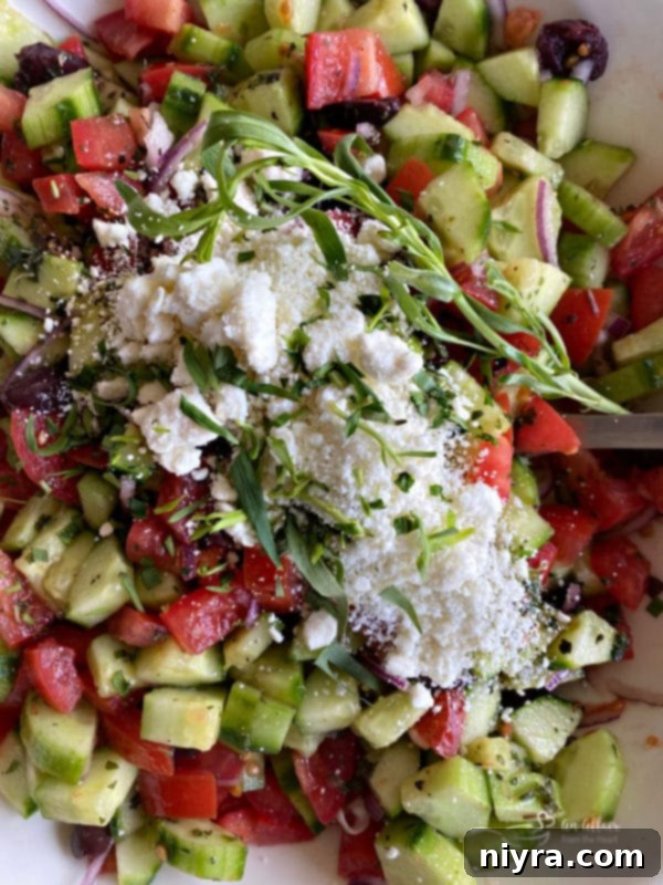 Refreshing Greek Cucumber Salad 9 Top view of Greek cucumber salad with salt and oregano