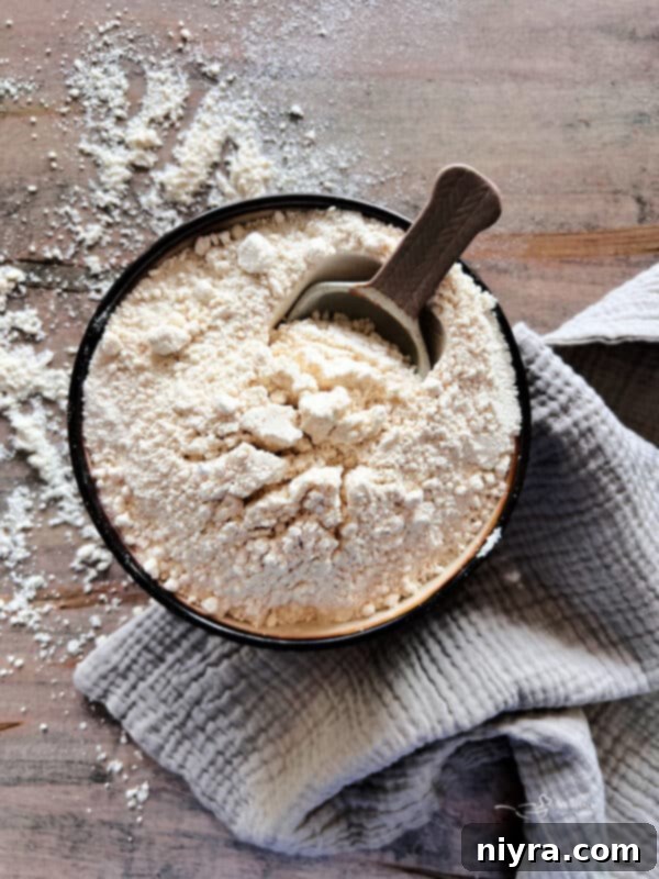 Homemade Bisquick Mix in a bowl with a whisk