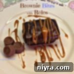 Molten Rolo Brownie Bites 2 Overhead of brownie bites with rolos and caramel sauce drizzled over it. Text "Brownie Bites with rolos"