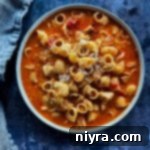 Creamy Chicken Parmesan Soup in a bowl, ready to be served