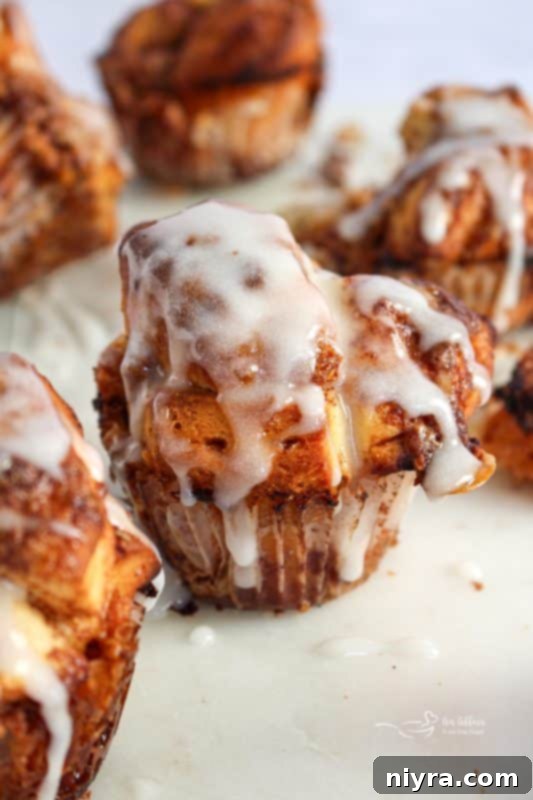 A serving of Toffee Monkey Bread Muffins, showing their soft, pull-apart texture.
