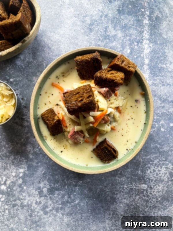 Reuben Chowder 11 Another beautiful shot of Cream of Reuben Soup in a bowl, highlighting its creamy texture.