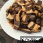 Rye Croutons on a white plate with text "Homemade Rye Croutons"