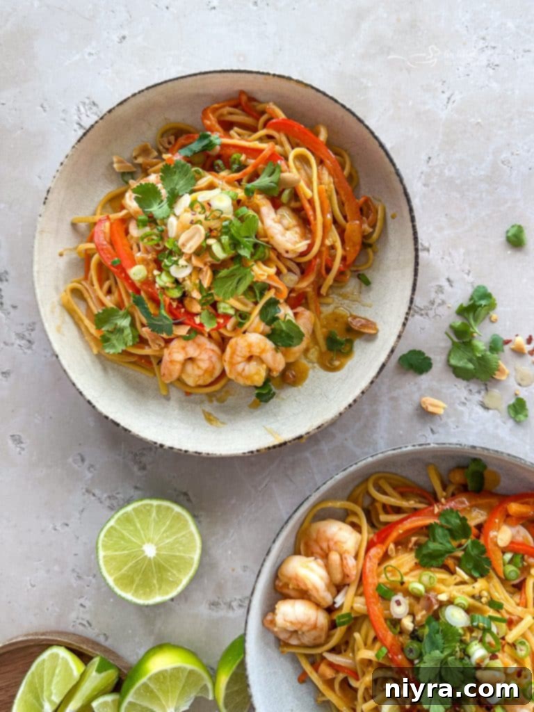 A Pinterest graphic for Pad Thai Wonderpot featuring a bowl of the dish and recipe title.