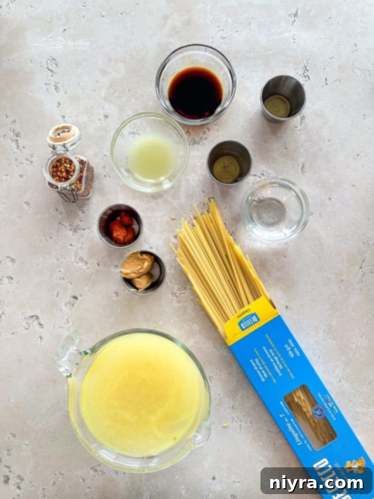 Close-up of fresh bean sprouts, a key ingredient for Pad Thai, in a glass bowl.