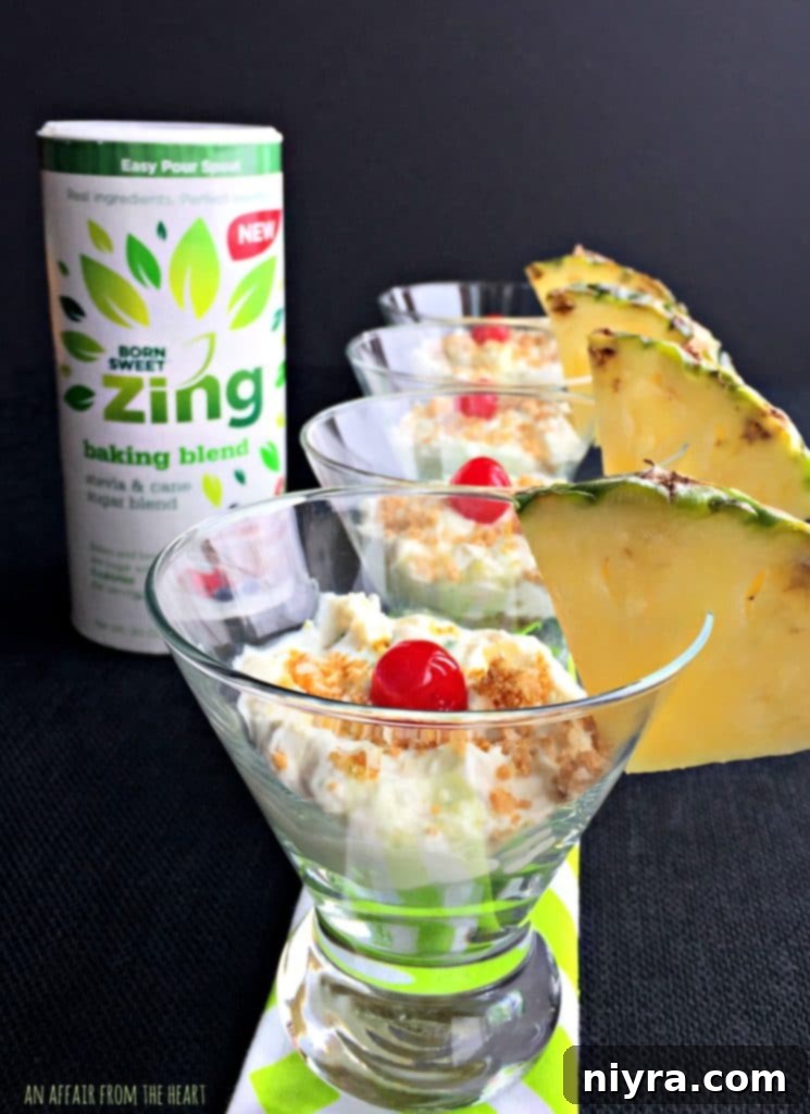 Individual No Bake Pina Colada Cheesecake in a stylish glass