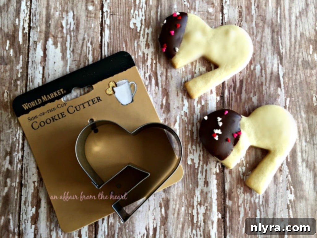 Enrobed Shortbread Delights 4 Unique heart-shaped cookie cutter designed to hang on the rim of a cup.