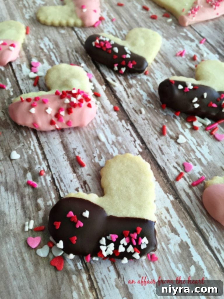 Enrobed Shortbread Delights 6 Variety of chocolate-dipped shortbread cookies with sprinkles, displayed beautifully.