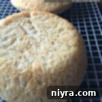 2 loaves of Peasant Bread on a cooling rack