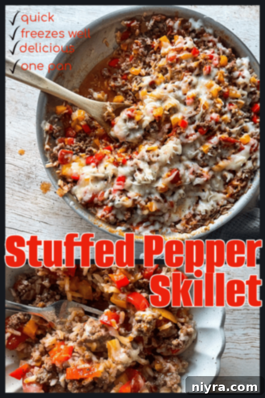 A vibrant hero shot of the Stuffed Pepper Skillet, served in a cast iron pan with a wooden spoon, garnished with fresh parsley.