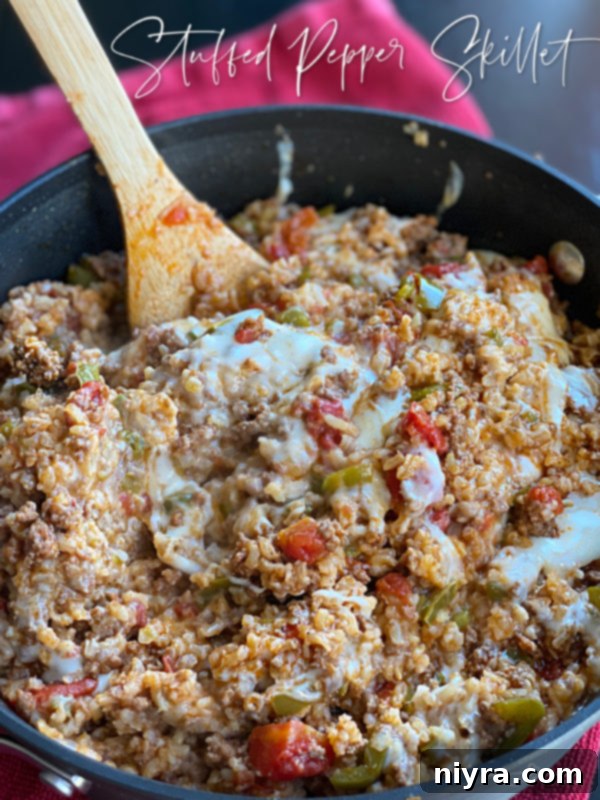 A stunning hero image of the Stuffed Pepper Skillet, with a clear title overlay, highlighting it as a featured recipe.