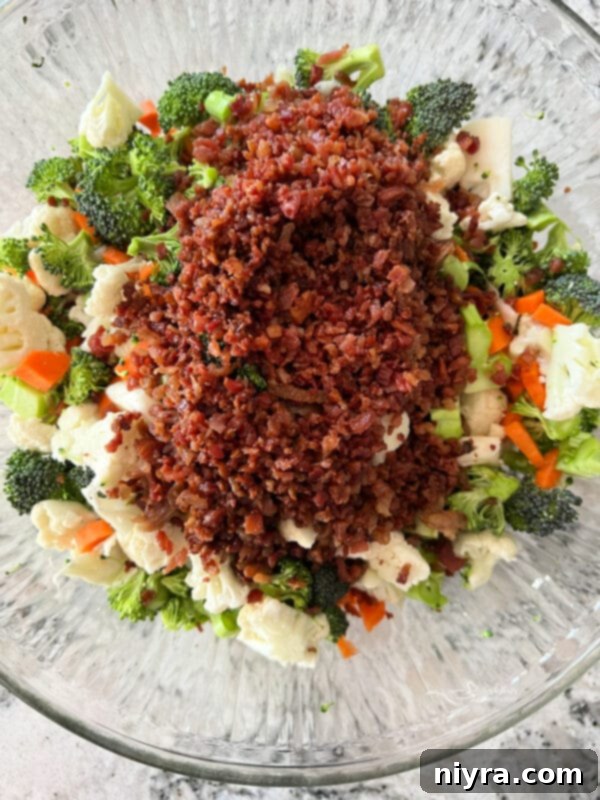 Pegs Fresh Italian Vegetable Salad 7 Chopped vegetables and crumbled bacon ready to be mixed for Peg's Salad