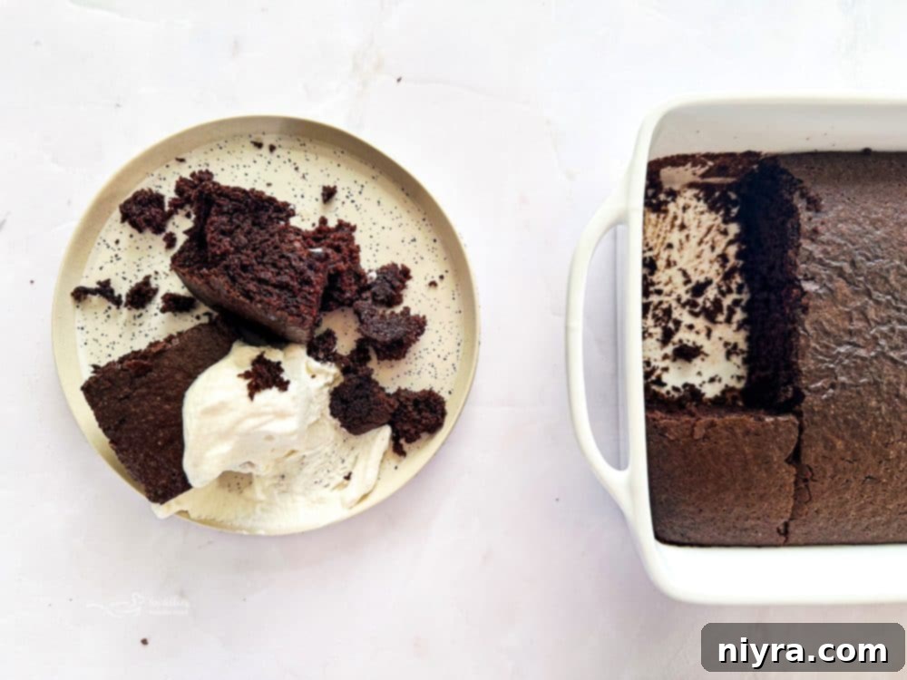 Two slices of Depression Cake on a white plate