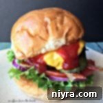 Crafting the Perfect Burger 12 The Best Burger close up on a white plate