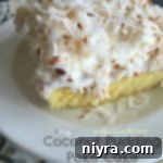 Close up of Coconut Pudding Poke Cake