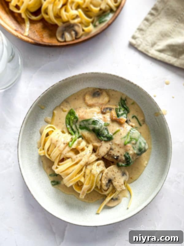 Plated Chicken Mushroom Florentine Pasta