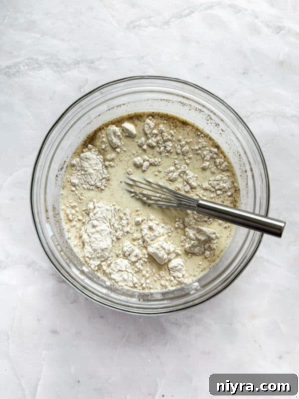 Mushrooms and garlic cooking in a skillet