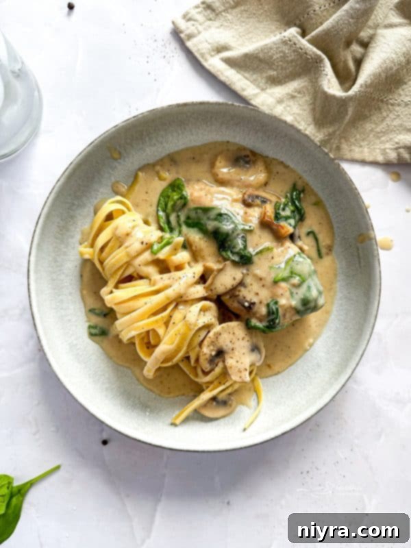 Chicken Mushroom Florentine Pasta in a skillet