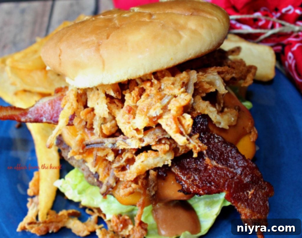 A Western Burger with a generous topping of golden fried onion strings