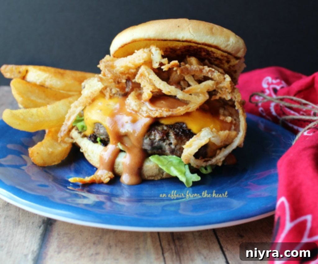 A beautifully assembled Western Burger with all its toppings ready to be eaten