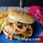 Western Burger and fries on a blue plate