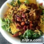Overhead view of a delicious homemade Wendy's Original Taco Salad in a white bowl