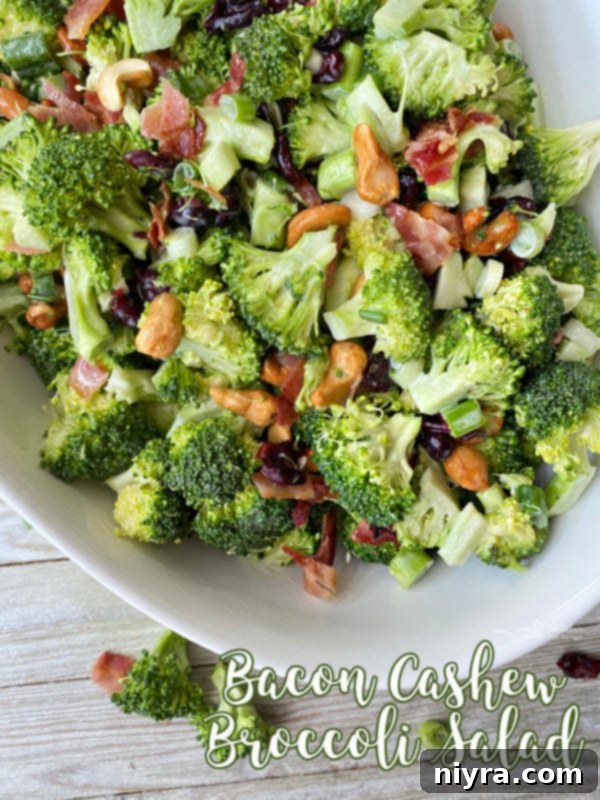 Bowl filled with bacon cashew broccoli salad
