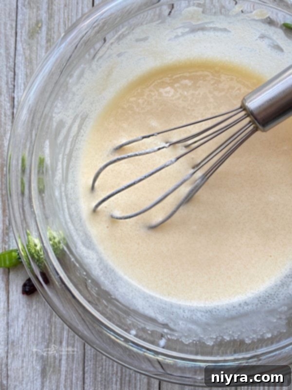 One bowl of dressing for bacon cashew broccoli salad