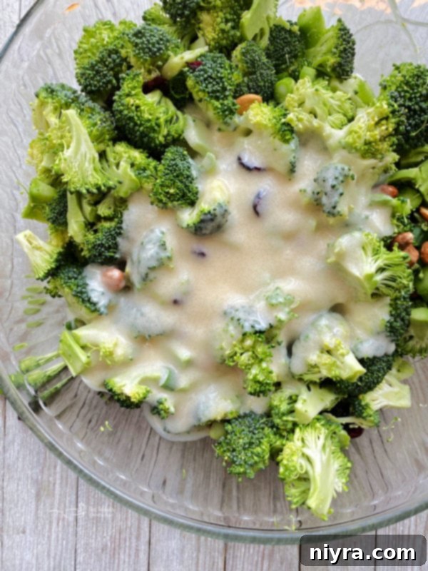 dressing in bowl with broccoli