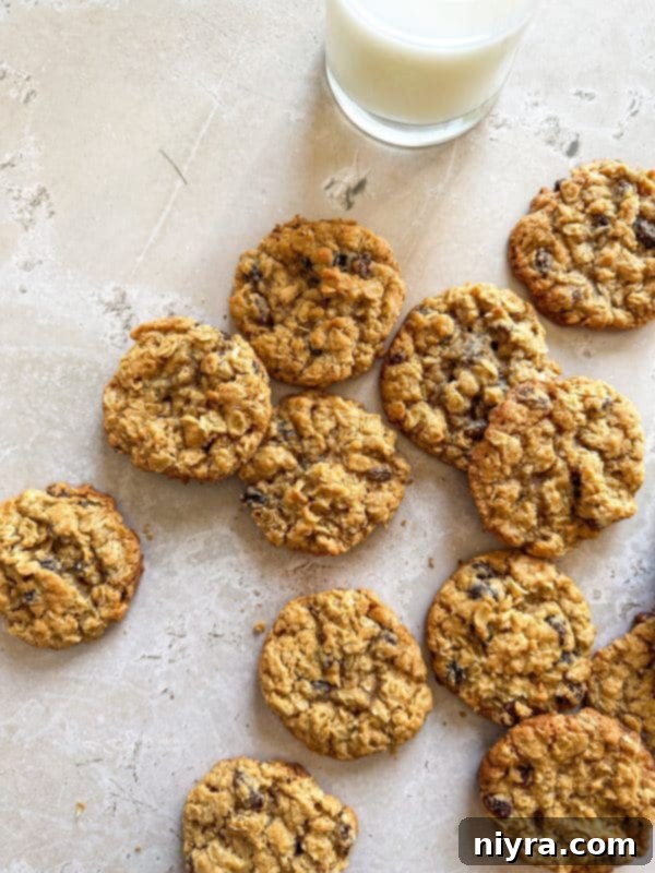 Bowl of mixed wet and dry ingredients for oatmeal raisin cookies before adding oats and raisins.