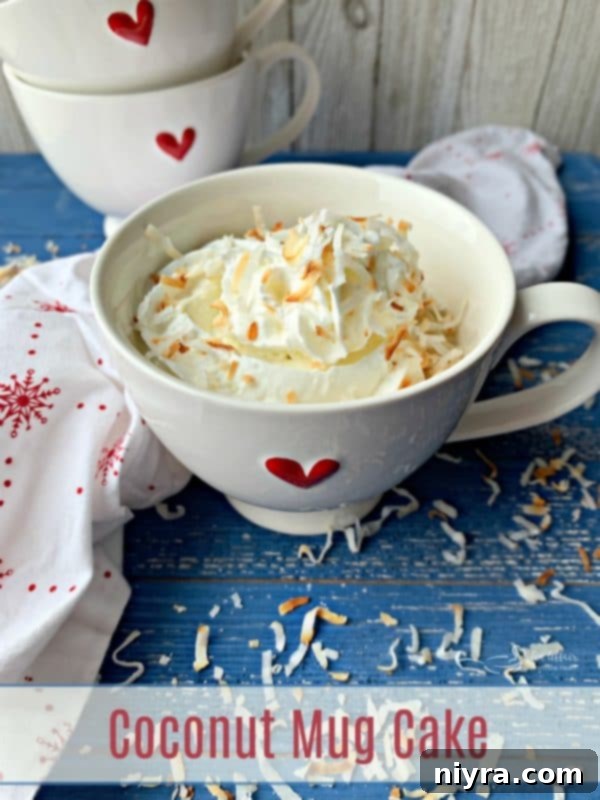 A delicious Coconut Mug Cake in a mug, perfect for a single serving.