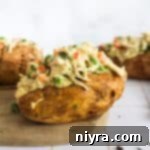 Side view of a Chicken à la King Baked Potato