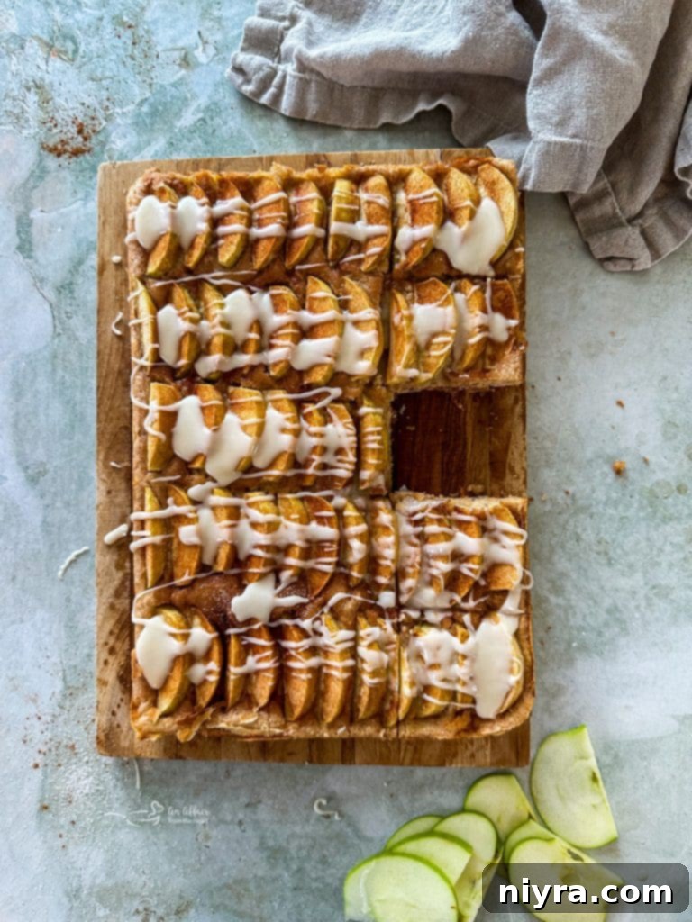 Top-down view of an entire German Apple Kuchen, freshly baked and glazed