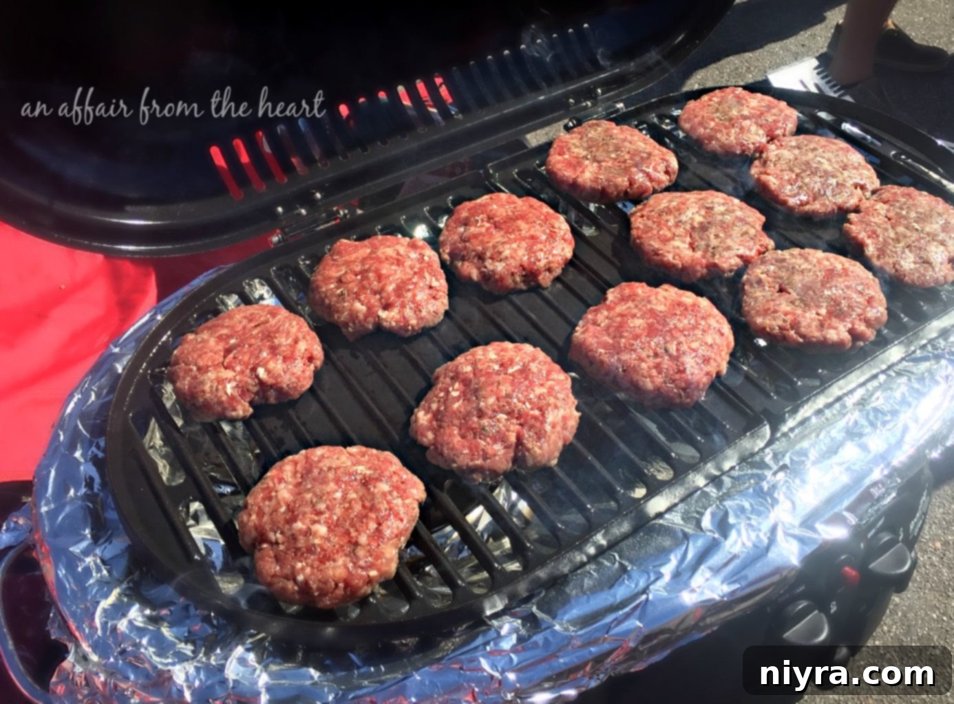 A selection of grilled Brat Burgers on buns with various toppings