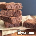 Old Fashioned Brownies stacked on a napkin