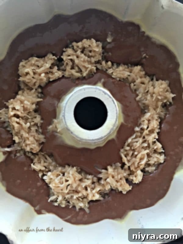 Velvet Chocolate Macaroon Hidden Gem Cake 5 Chocolate Macaroon Tunnel Cake batter and coconut filling being prepared in bowls