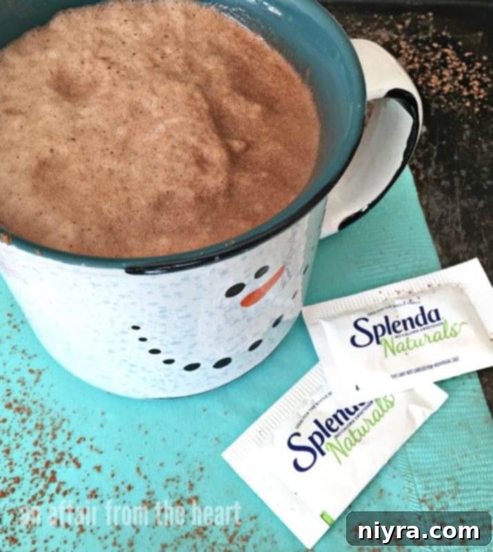 Close-up of Peanut Butter Hot Cocoa with a hint of froth, inviting a sip