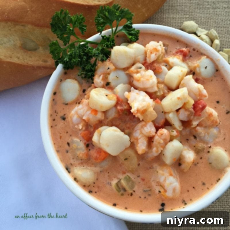Delicious Creamy Tomato Seafood Bisque in a white bowl