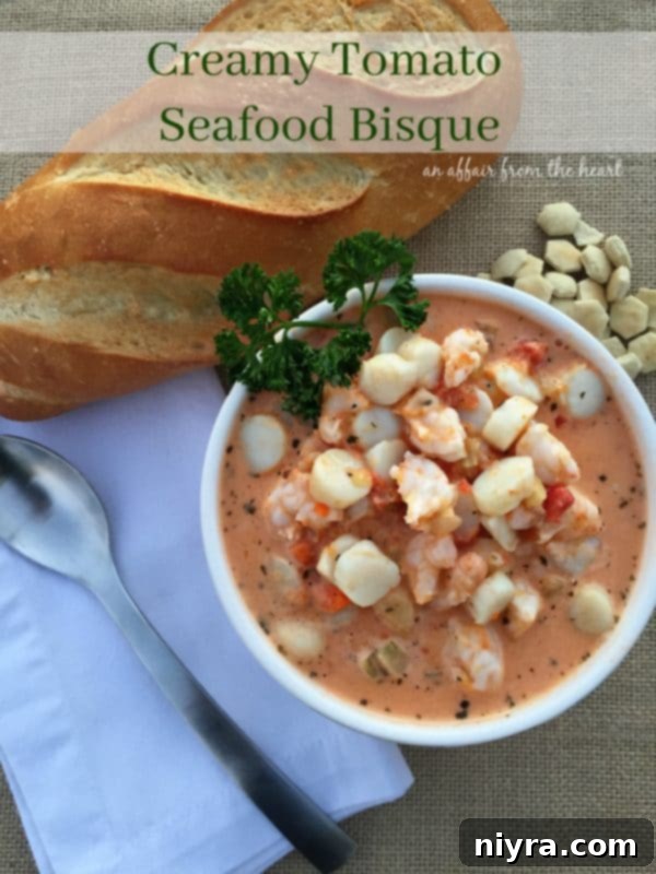 Creamy Tomato Seafood Bisque closeup in a white bowl