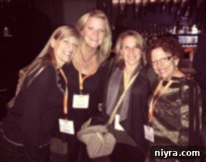 Bloggers at an event: Debbie, the author, Michelle, and Linda smiling