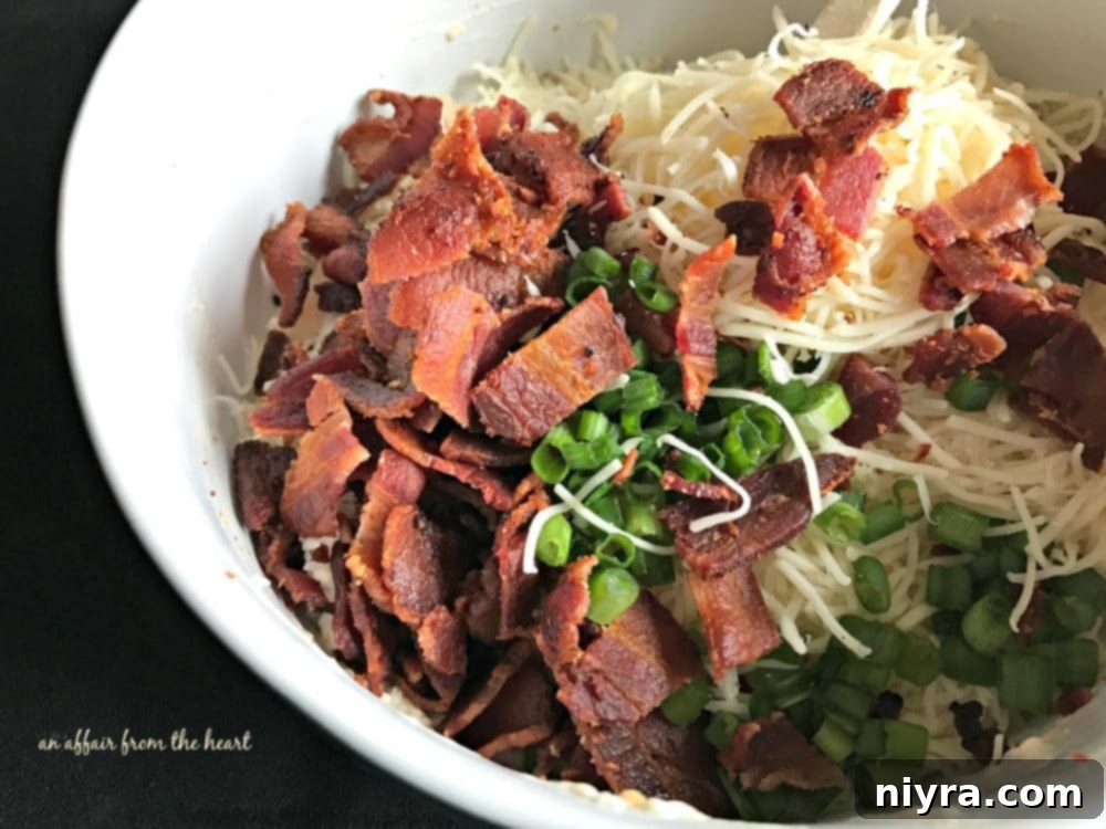 Hot Bacon and Swiss Dip 7 Mixed Hot Bacon & Swiss Dip spread into a baking dish