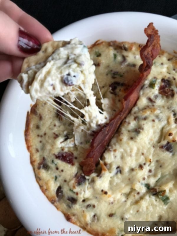 Hot Bacon and Swiss Dip 8 Hot Bacon & Swiss Dip baking in the oven, bubbly and golden