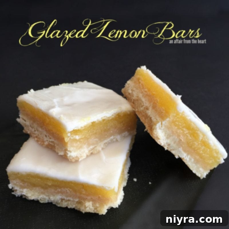 Tangy Lemon Delights 9 Beautifully glazed lemon bars, perfectly cut into squares, ready for serving.