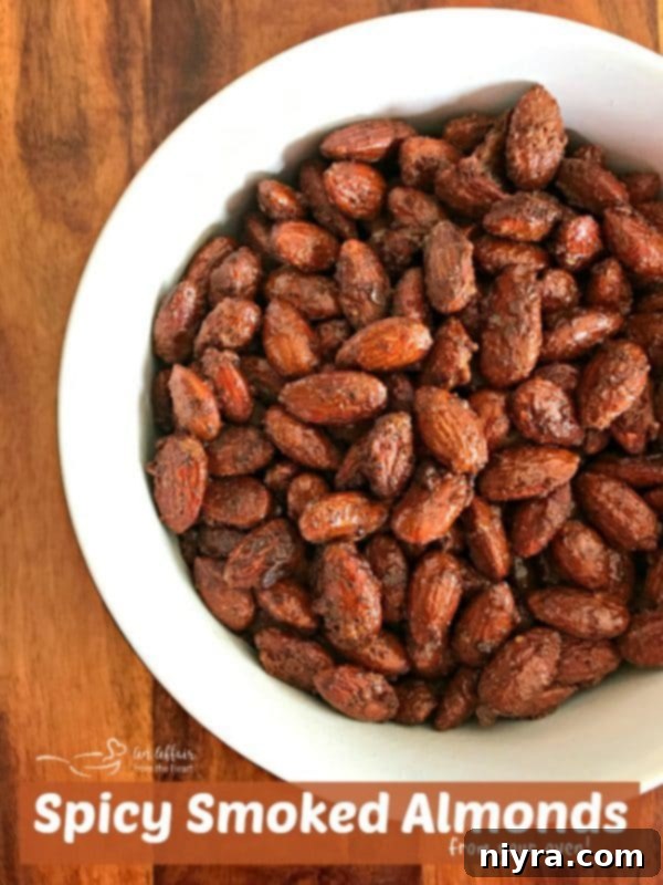 Smoky Heat Almonds 13 A bowl of Spicy Smoked Almonds with a handwritten note saying 'Spicy Smoked Almonds from your oven'.
