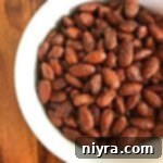 Smoky Heat Almonds 15 Spicy Smoked Almonds in a white bowl