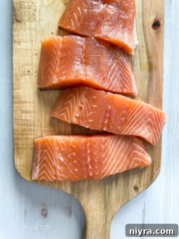 Pan-Seared Salmon and Shrimp in Lemon Caper Sauce 6 Top view of salmon on cutting board